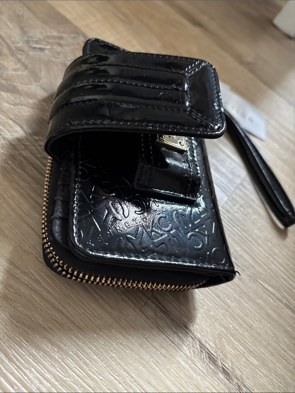 Kenneth Cole Reaction Glossy Black Embossed Zip Wallet - Picture 5 of 9